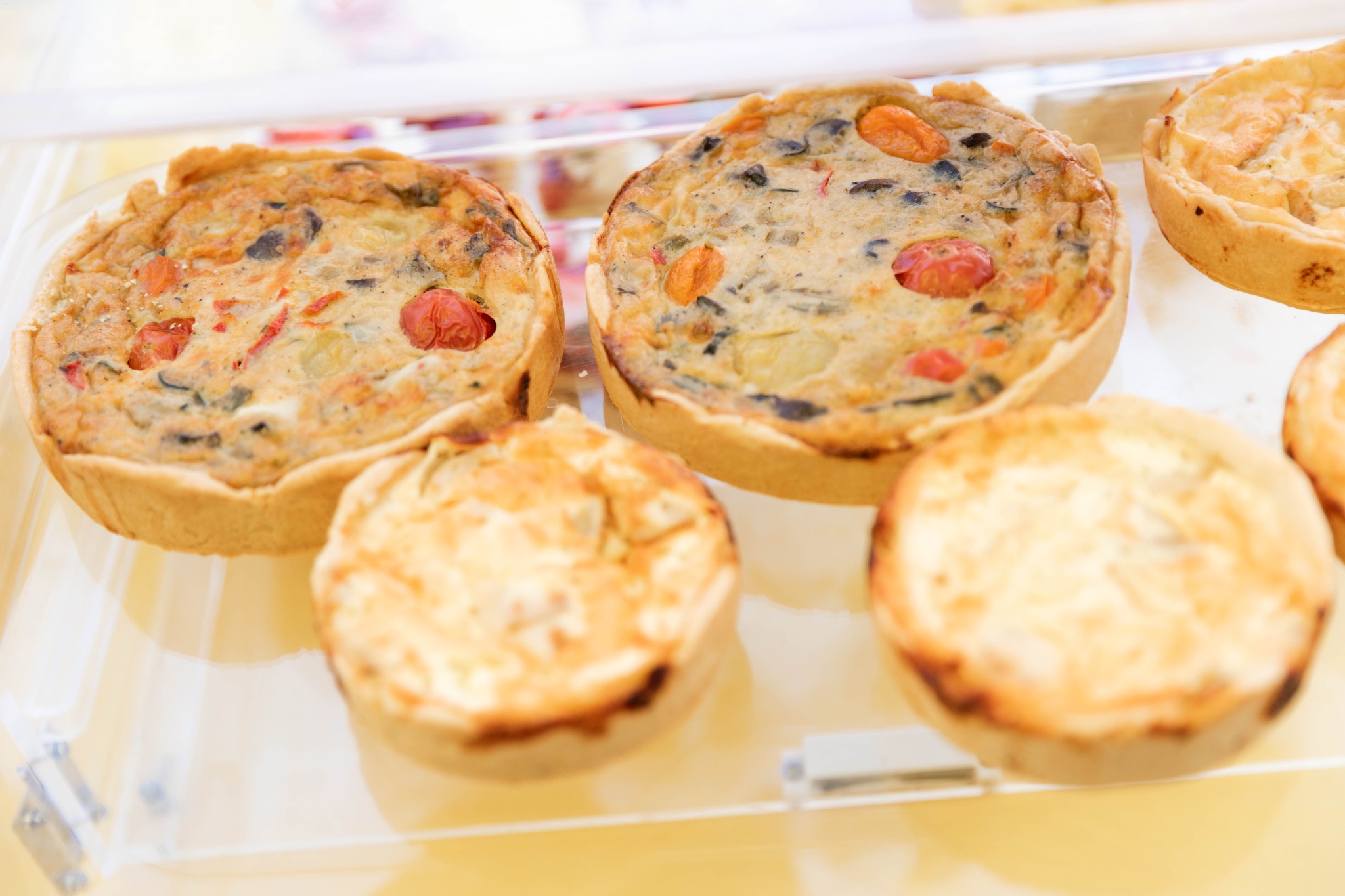 Assortment of freshly baked savory tarts